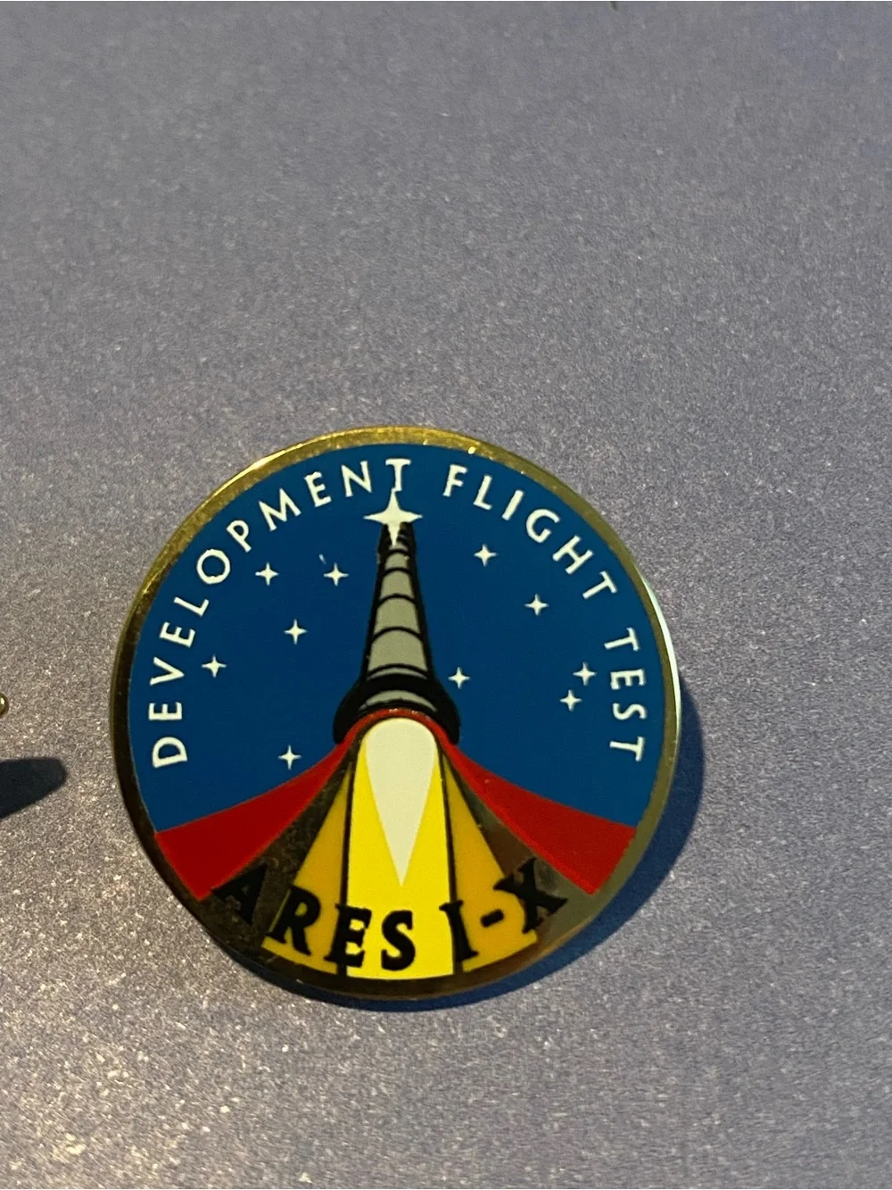 Columbia Space Shuttle Lapel Pin - Orange and Blue